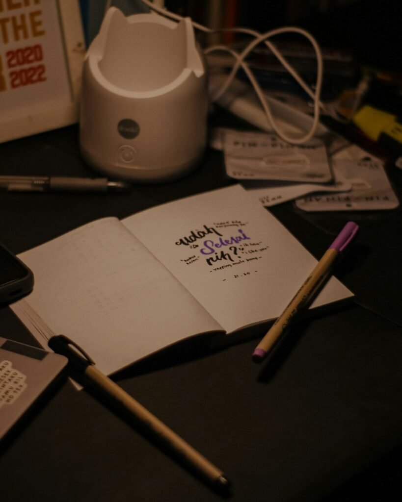 Desk with notepad and pen, inviting warm workspace