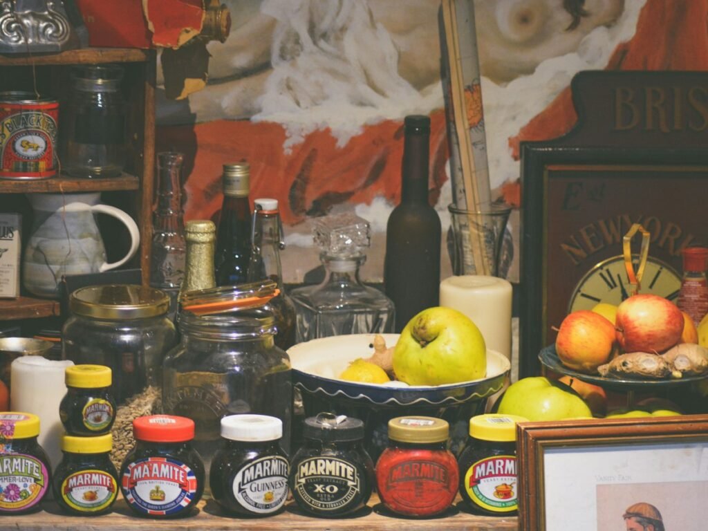 Pantry shelf with jars, cans, and pantry staples